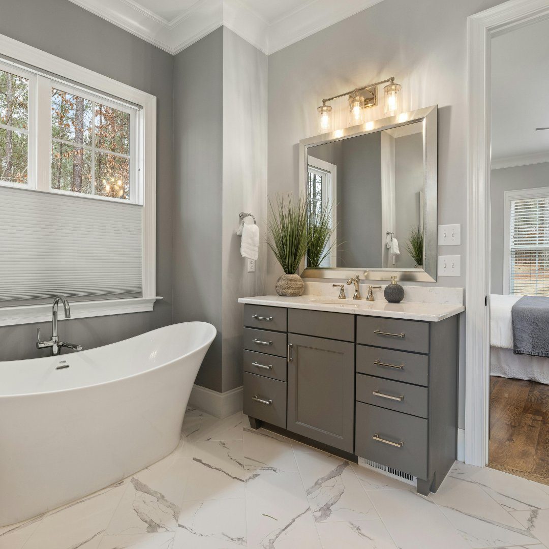 Bathroom with freestanding tub and fireplace