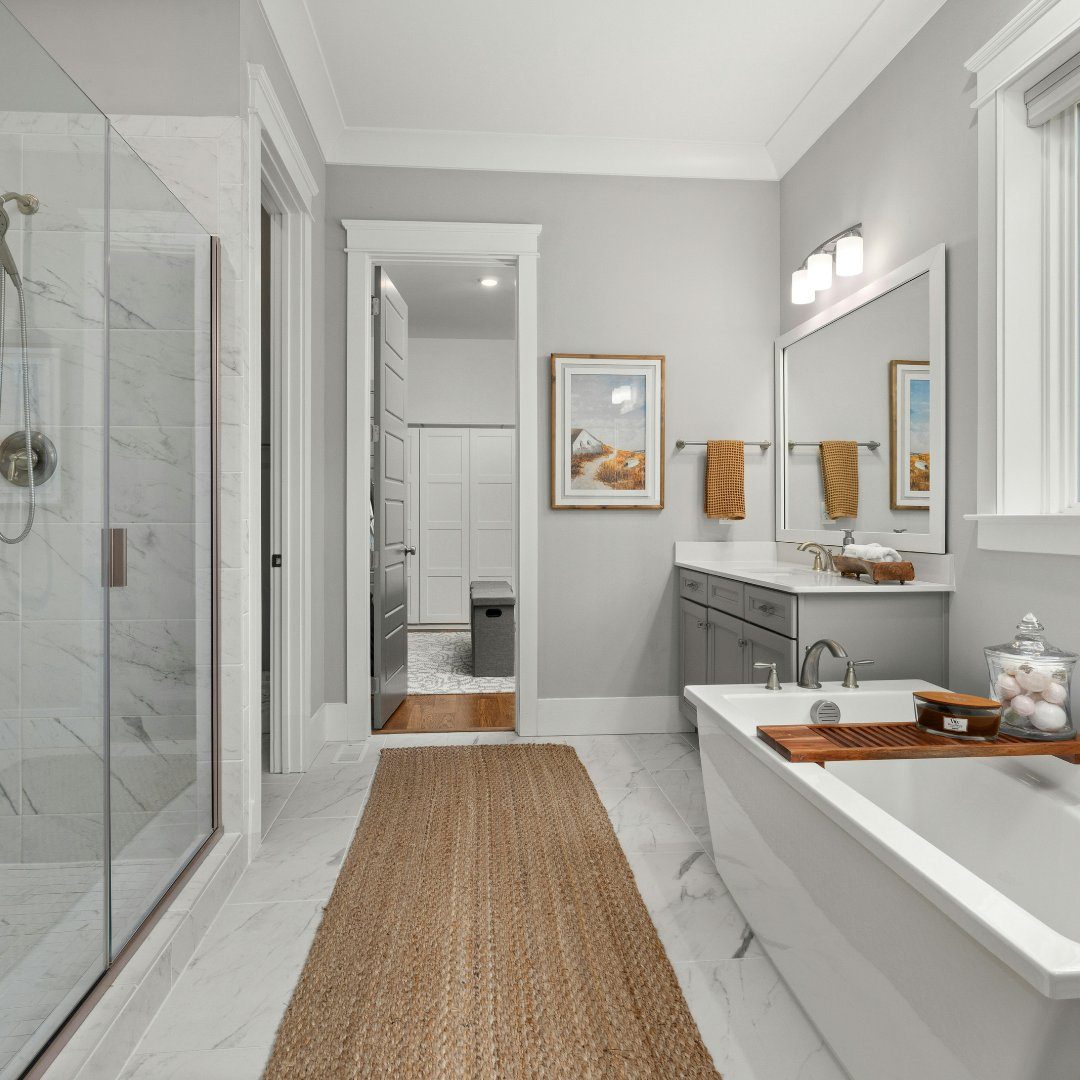 Traditional bathroom with hex tile floor