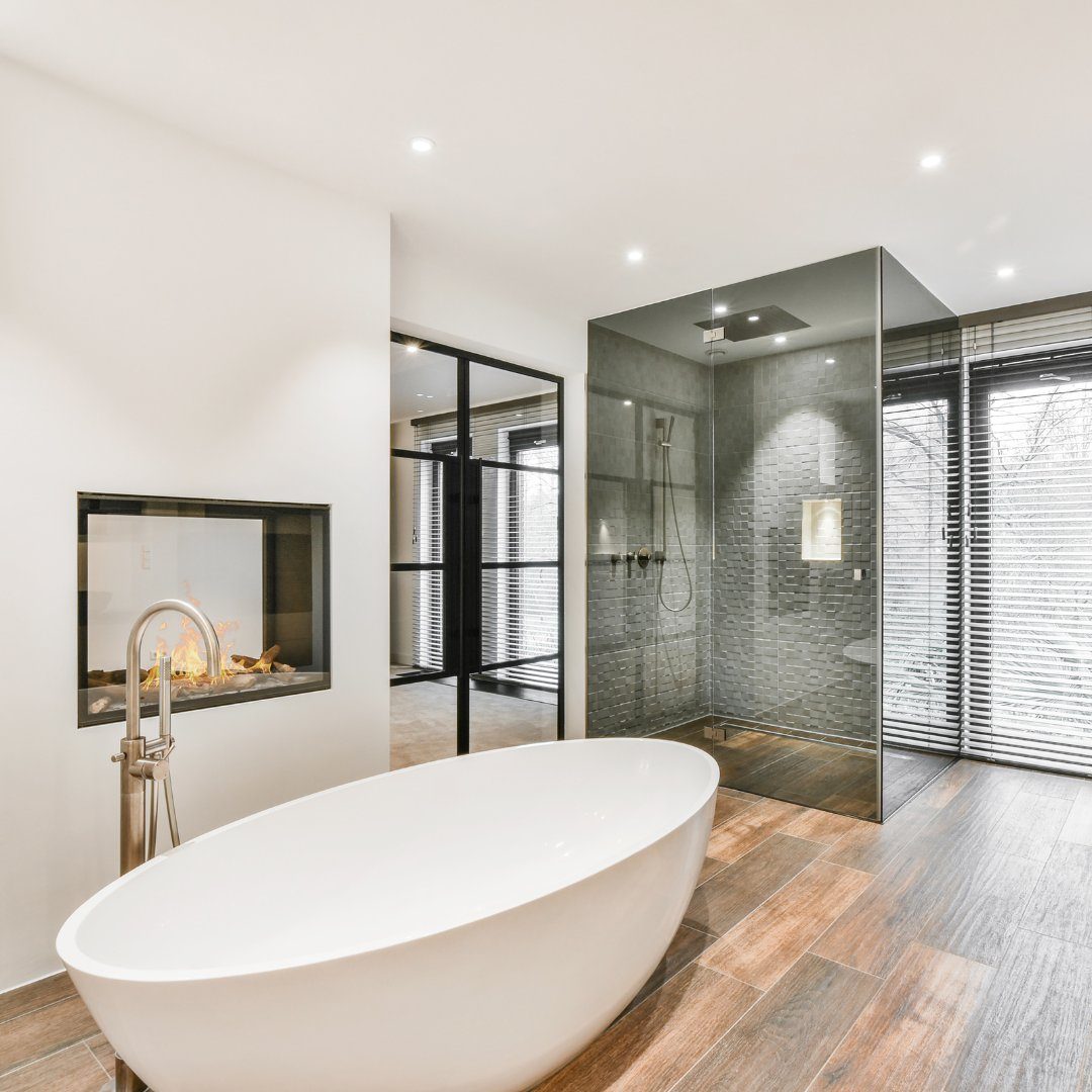 Bathroom with grey vanity and marble tile