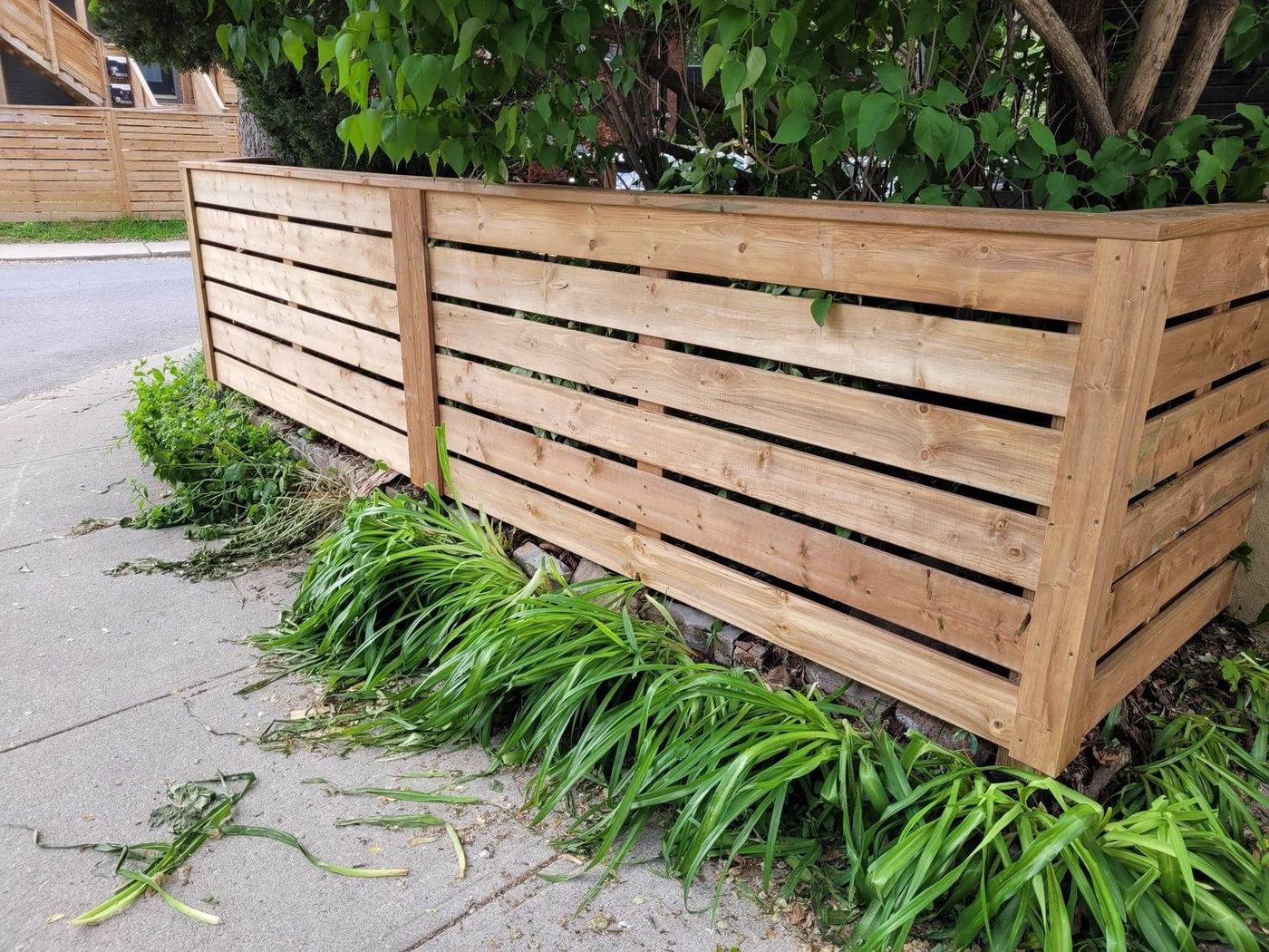 Horizontal wood planter fence