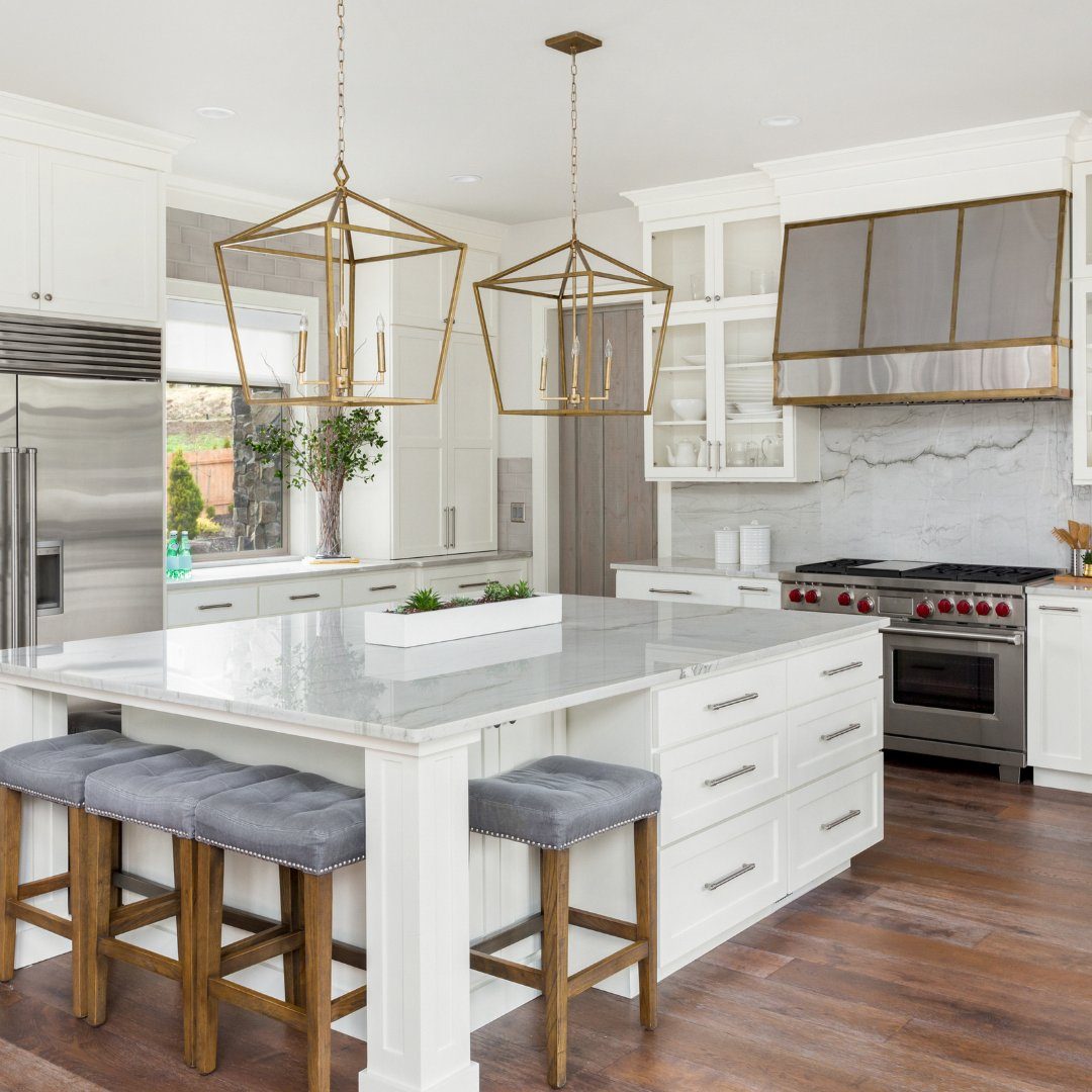 Grey kitchen with brass hardware
